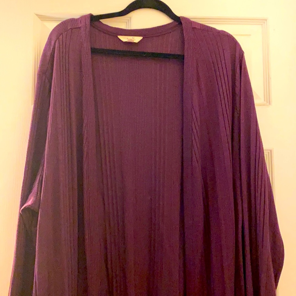 Open front top. Like a cardigan (not a sweater).